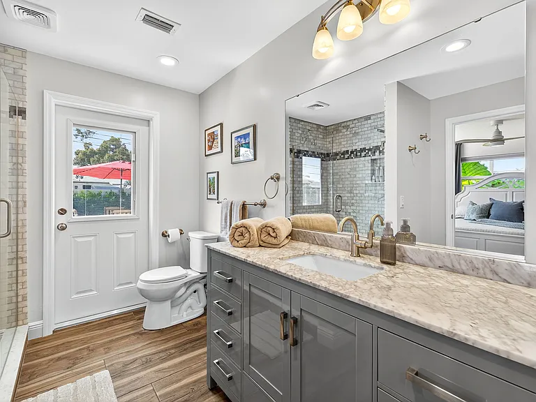 Primary bathroom and walk-in closet.