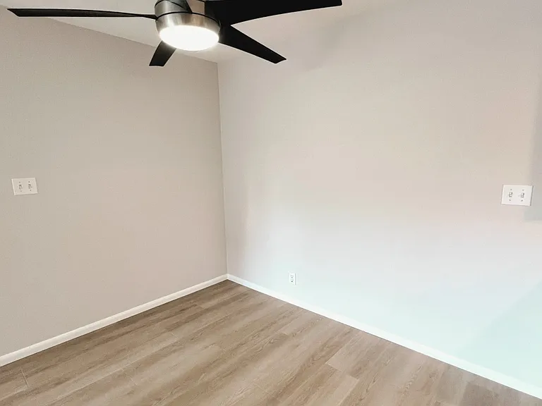 Dining room next to open kitchen and living room