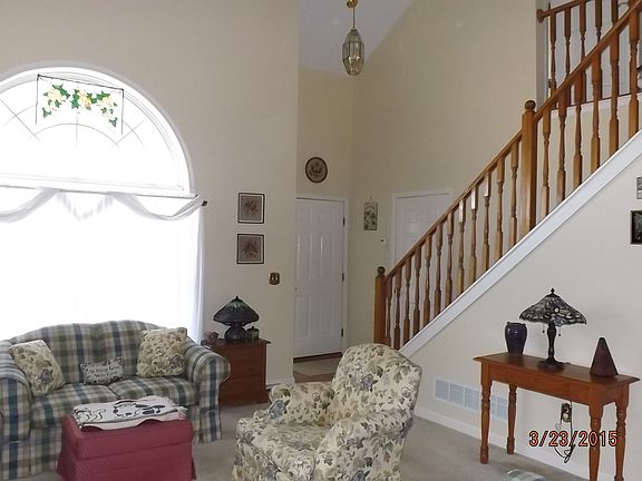 LIVING ROOM AND FOYER