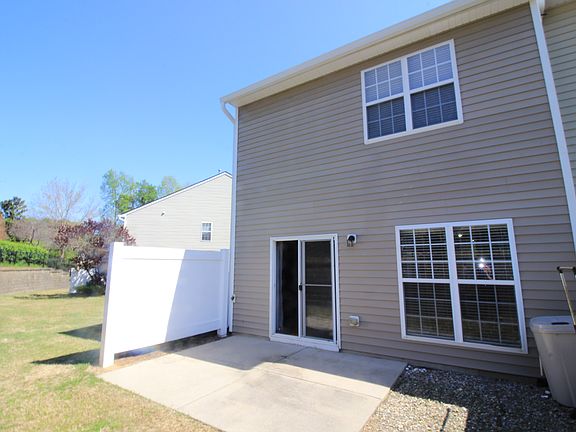 Back of the townhouse and patio.