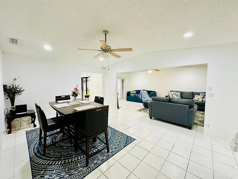 5077 Forsythia St — Photo 3