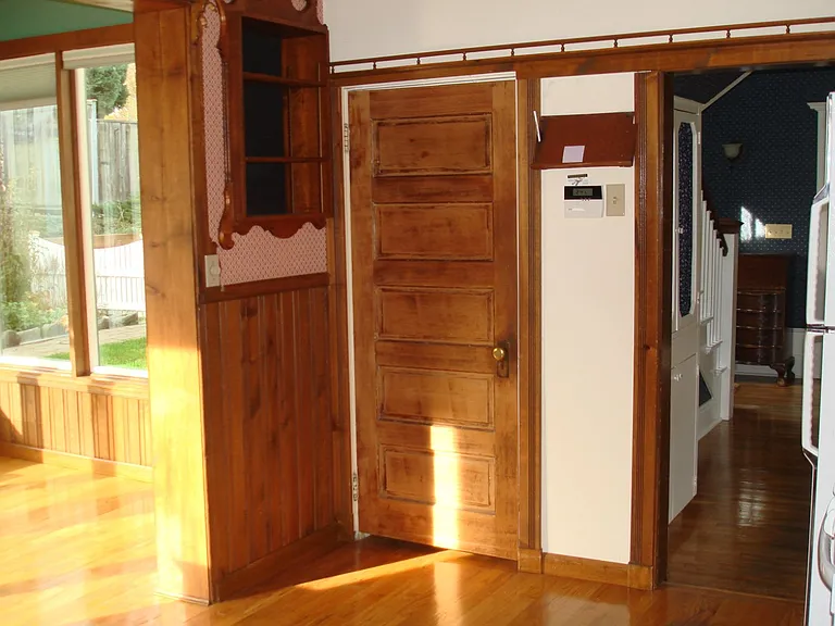 Door from Kitchen to Basement
is Mid Photo, Sunlite Breakfast Room
is to the Left