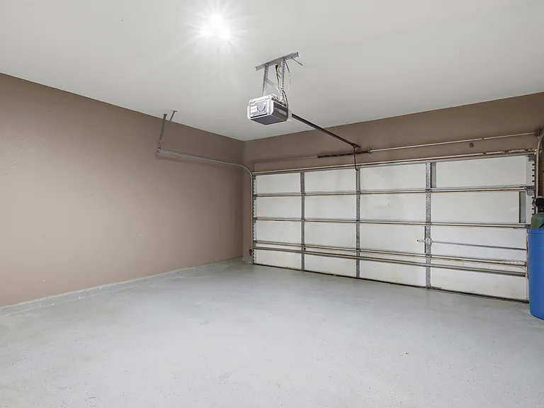 Two-car garage with split AC unit. Perfect for a home gym