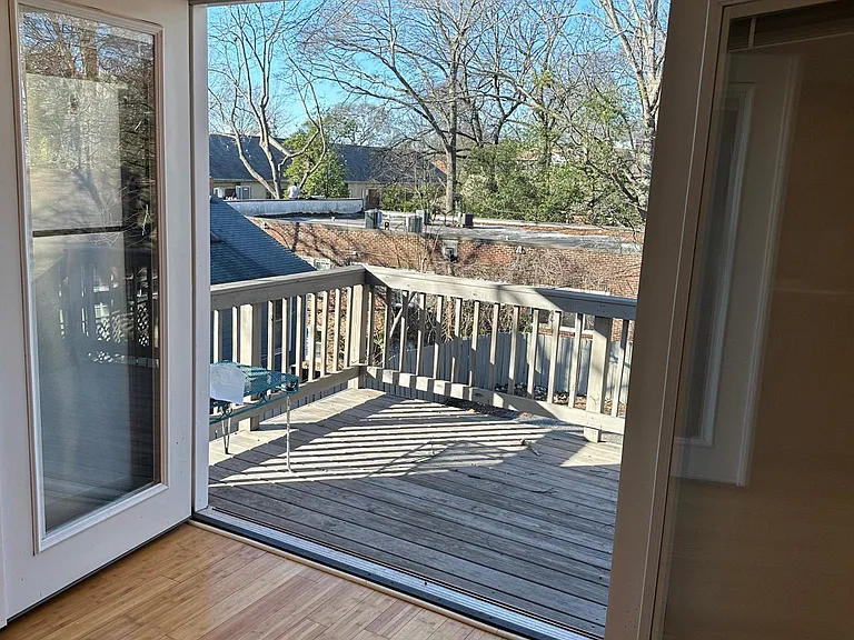 French doors open onto back porch
