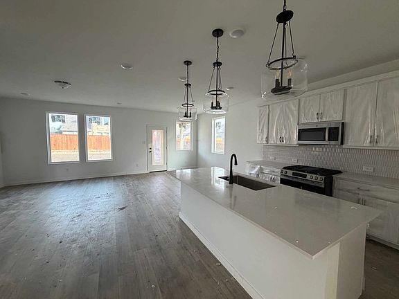 Open Kitchen-Living-Dining Room Construction Progress featuring the Harmony Collection