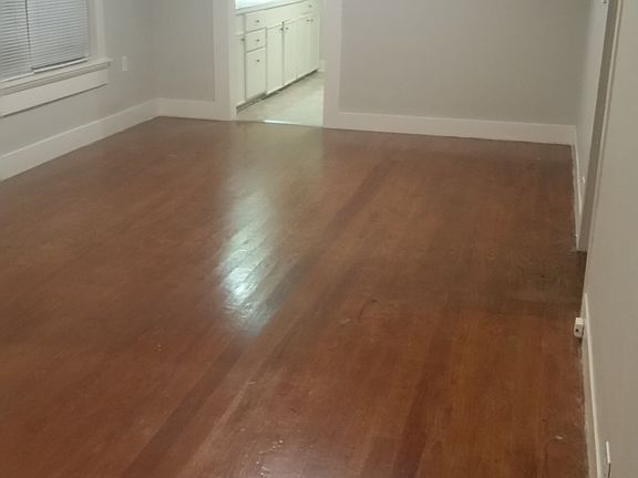 Big living area with nice hard wood floors