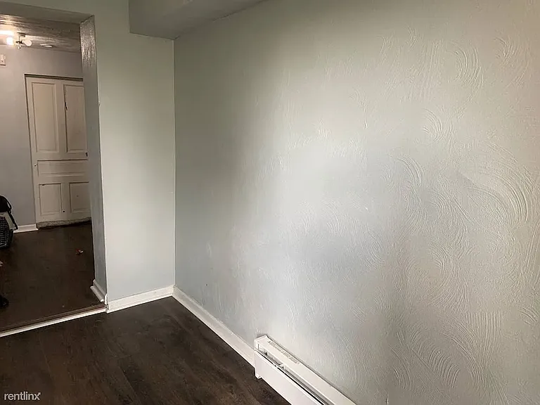 Hallway showing laundry room door
