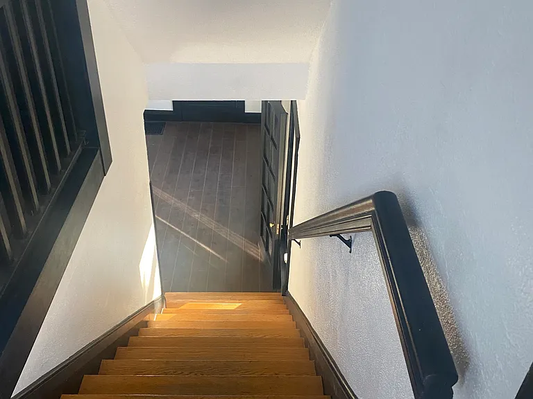 stairs heading downstairs to first floor