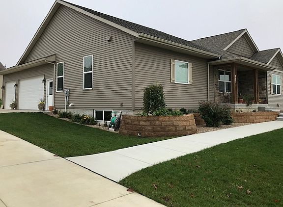 Side load three stall garage