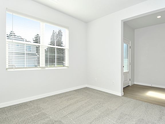 There is a flex space off of the foyer.