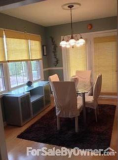 Dining room that leads to large L shaped deck.
