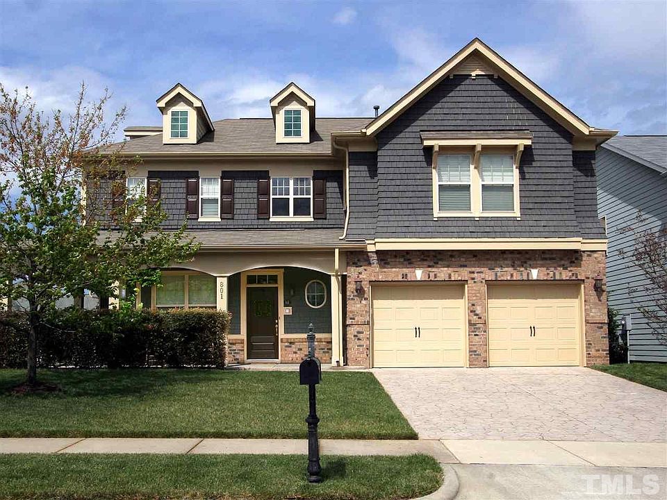 Great Craftsman-style home in Morrisville's Twin Lakes. Neighborhood features sidewalks, community pool and clubhouse, tennis and volleyball courts, and playground.