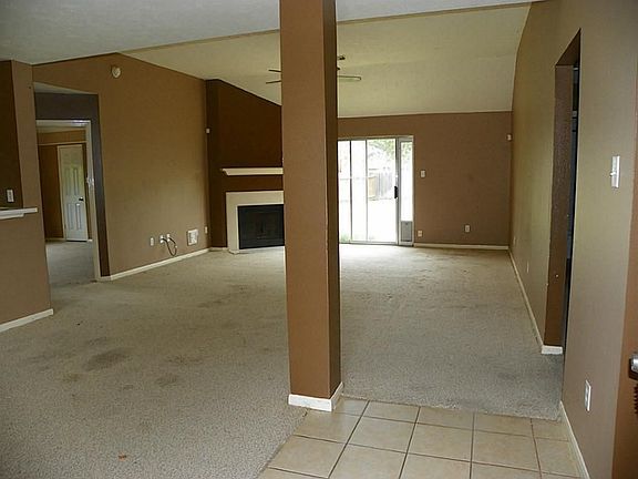 Step inside to this open concept floor plan.  Living room in front, dining to the left.