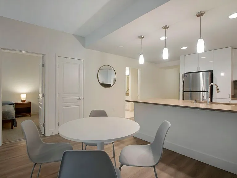 Furnished+ apartment homes include a dining set (Representative Image exact items and style of furnishings may vary)