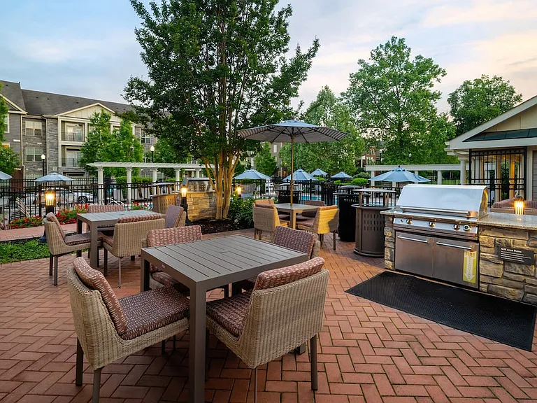 Courtyard with barbeque grills and picnic seating