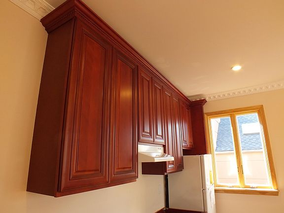 Kitchen includes full refrigerator, and stovetop with exhaust (sorry, no oven)