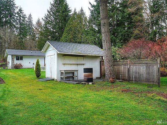Photo take from back of property showing back of shed and home in the background up towards Phillips Rd.