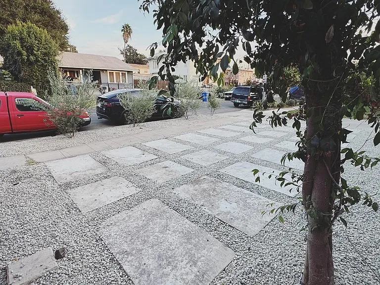 Front Parking (one space dedicated to unit) w/access to EV charger