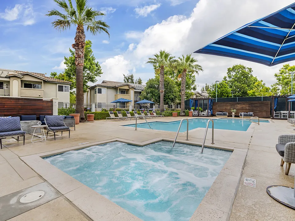 The Summit's pool deck offers the perfect blend of relaxation and luxury with plenty of individual sunloungers and a beautiful on-site spaideal for unwinding after a long day.