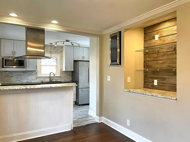 Dining area with wine/beverage cooler.