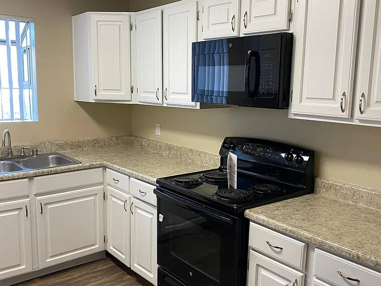 downstairs 2 bedroom - right side of kitchen
