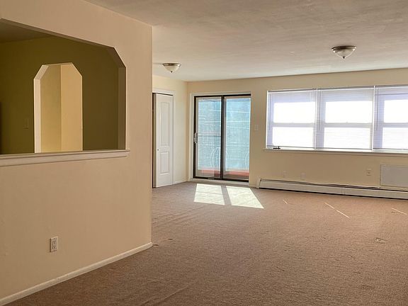 This is the living room, viewed from the dining area