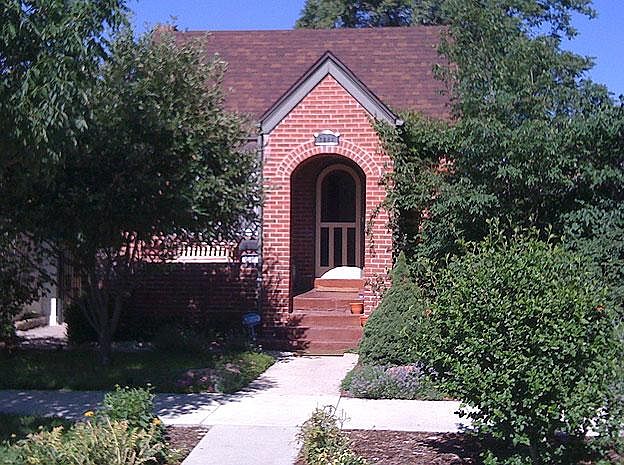 Landscaping incl. Cherry tree, Redbud & perennials.