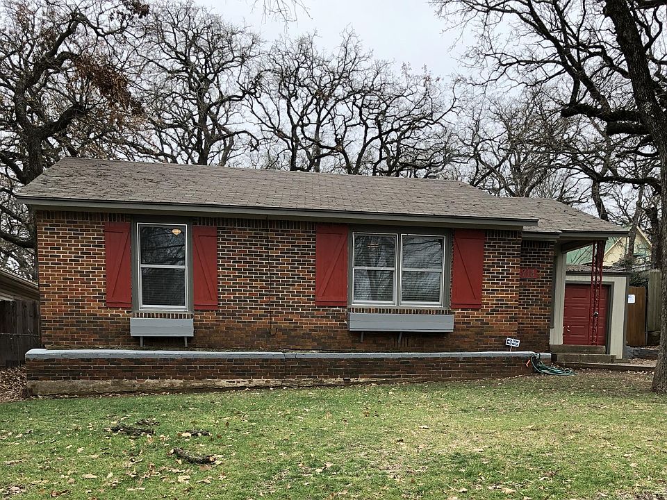 Front of house with planter boxes under the windows.
