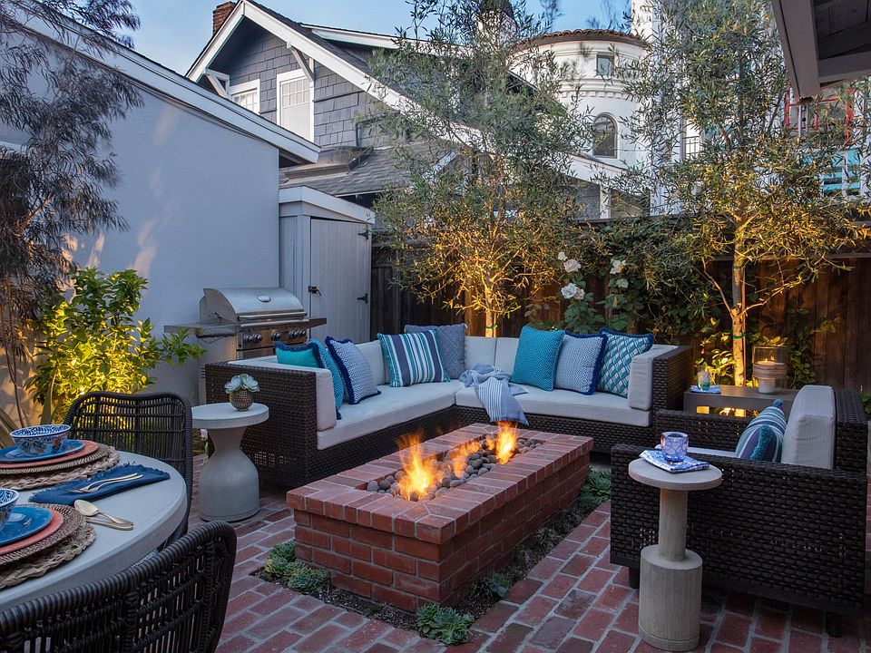 Private patio with gas fire pit and hookups for a BBQ.