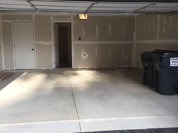 two car garage and driveway parking