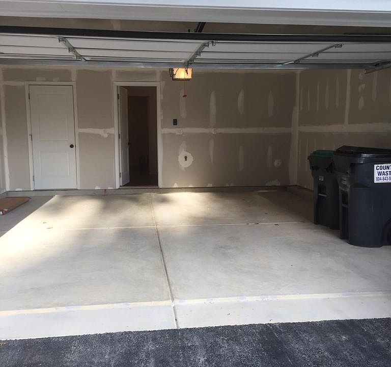 two car garage and driveway parking