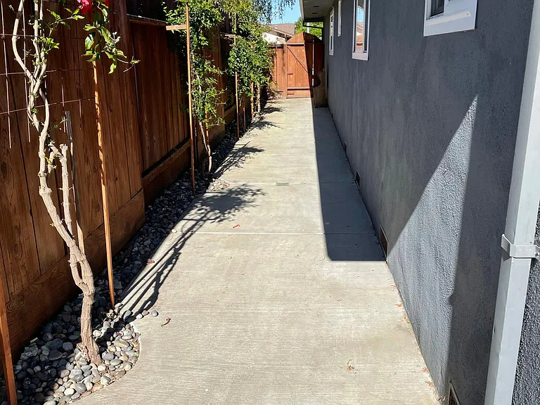 Beautiful clean landscaping. Southern end of property.