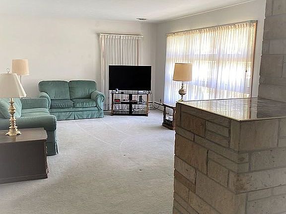 Living room w large windows