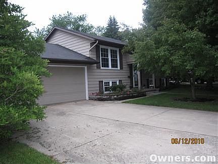 Front of home w/attached 2 car garage.