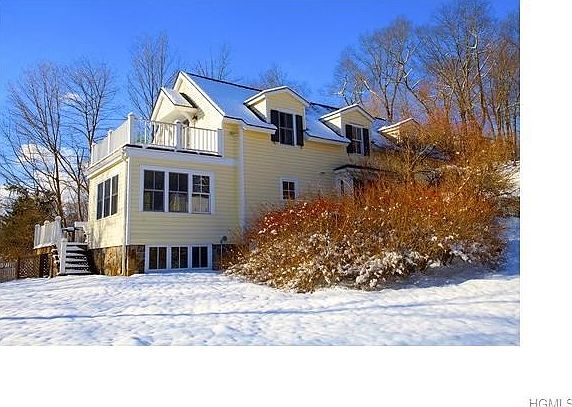 The south facing kitchen and dining rooms have several windows that welcome in the natural sunlight 