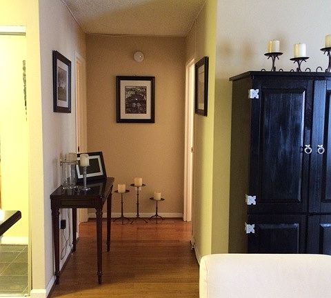 Hallway to bathroom (left) and bedroom (right)