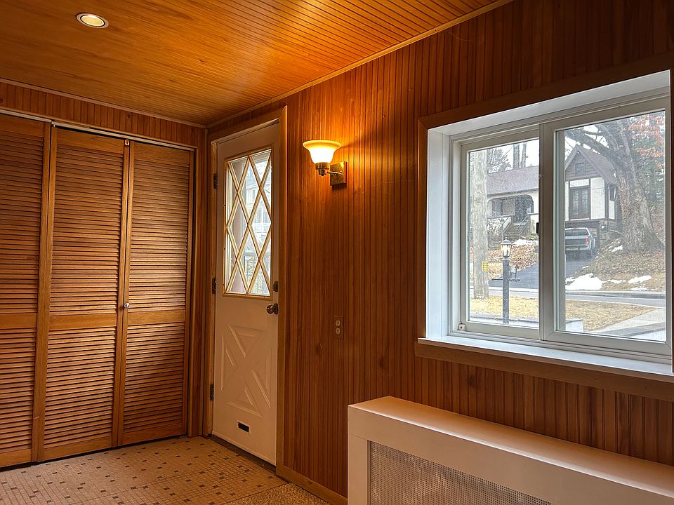 Foyer with coat closet.