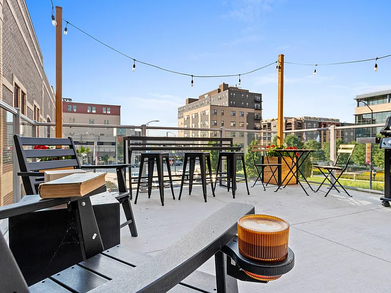 Not just a patio-a gathering place with city views and neighborly vibes. Welcome to your open-air living room.