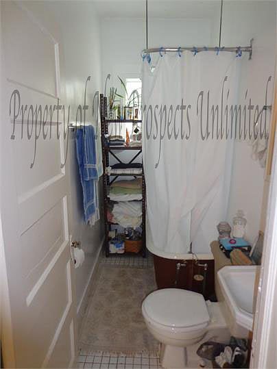 Bathroom with claw foot tub