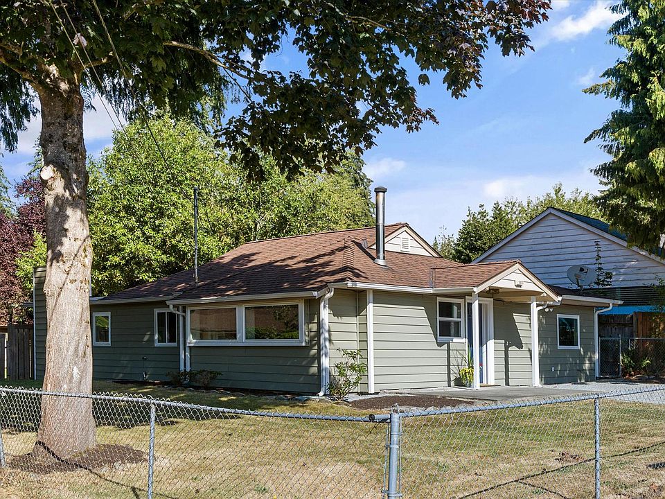 Corner house with huge fenced in yard