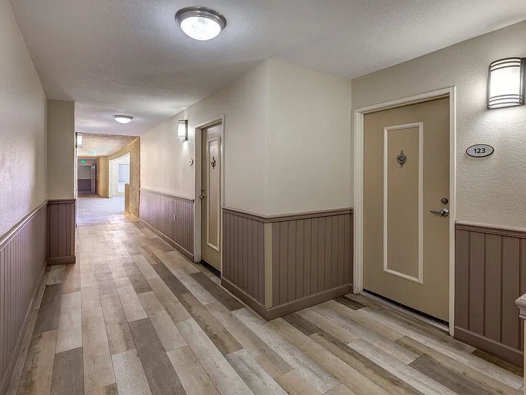 Apartments in Burbank, CA - Interior Building Hallway with Apartment Entrances