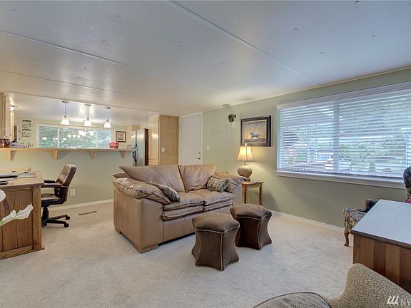 The versatile floor plan is light, bright and cheery! Large picture windows pour in natural light.