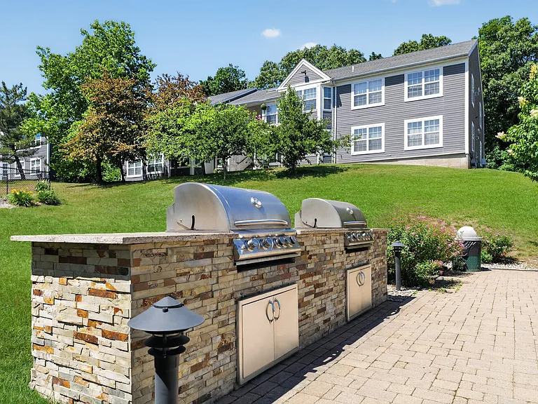 Elevate your lifestyle at Summit at Mill Ridge, where modern amenities blend with serene landscapes. Enjoy grilling at our stylish outdoor area, perfect for gatherings. Take the next step toward your ideal home today!