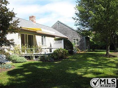 Extremely private backyard with deck off the Livingroom and an awning to provide some shade on those