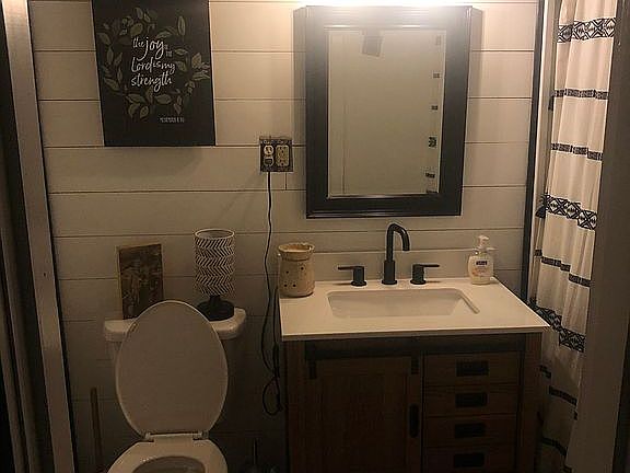 New toilet, vanity, tile 