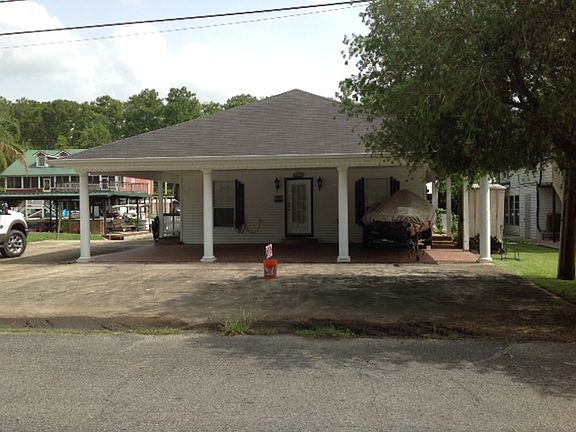 Covered parking or patio area : Very low maintenance, grass cutting time is less than 5 min.s