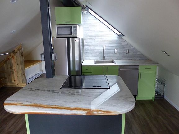 Granite countertops finish off this stylish Euro-kitchen.