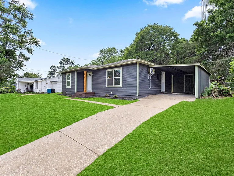 Carport to protect your vehicle and plenty of off-street parking