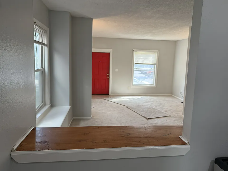 View from kitchen through dining room and living room