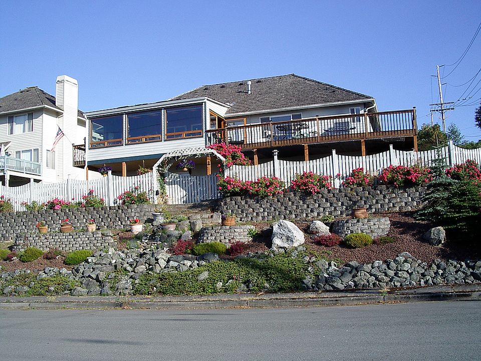 Front of Home with Natural Garden